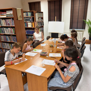 Spotkanie w bibliotece w ramach wakacyjnych zajęć dla dzieci pod hasłem "Legendy polskie"