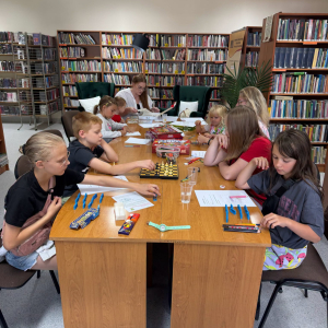 Dzień planszówek i zagadek-zajęcia wakacyjne w bibliotece